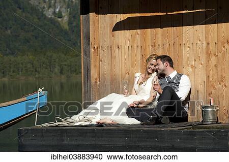"Wedding couple at Almsee Lake, Salzkammergut, Upper Austria, Austria, Europe" View Large Photo Image Stock Image - "Wedding couple at Almsee Lake, Salzkammergut, Upper Austria, Austria, Europe". Fotosearch