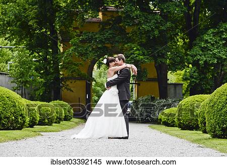 "Wedding couple in the park of Schloss Ambras Castle, Innsbruck, Tyrol, Austria, Europe" View Large Photo Image Stock Photography - "Wedding couple in the park of Schloss Ambras Castle, Innsbruck, Tyrol, Austria, Europe". Fotosearch