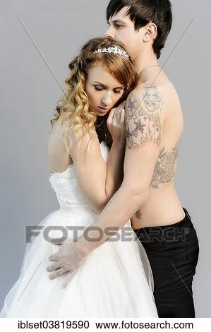 "Wedding picture, bride and groom, bare chested groom with tattoos" View Large Photo Image Stock Image - "Wedding picture, bride and groom, bare chested groom with tattoos". Fotosearch