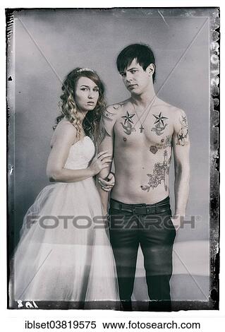 "Wedding picture, bride and groom, bare chested groom with tattoos" View Large Photo Image Stock Photography - "Wedding picture, bride and groom, bare chested groom with tattoos". Fotosearch