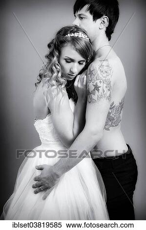 "Wedding picture, bride and groom, bare chested groom with tattoos" View Large Photo Image Stock Photography - "Wedding picture, bride and groom, bare chested groom with tattoos". Fotosearch