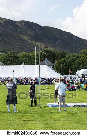 "Weight over the bar, a sports discipline, Helmsdale Highland Games, Helmsdale, Sutherland, Scotland, United Kingdom, Europe" View Large Photo Image Stock Photo - "Weight over the bar, a sports discipline, Helmsdale Highland Games, Helmsdale, Sutherland, Scotland, United Kingdom, Europe". Fotosearch