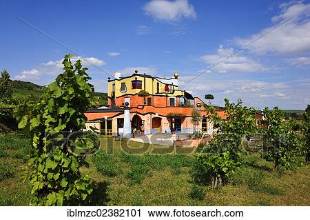 "Weingut Hirn winery, built by the artist Friedensreich Hundertwasser, surrounded by vineyards, Dipbacher Str 8, Untereisenheim, Lower Franconia, Bavaria, Germany, Europe, PublicGround, Europe" View Large Photo Image Stock Image - "Weingut Hirn winery, built by the artist Friedensreich Hundertwasser, surrounded by vineyards, Dipbacher Str 8, Untereisenheim, Lower Franconia, Bavaria, Germany, Europe, PublicGround, Europe". Fotosearch