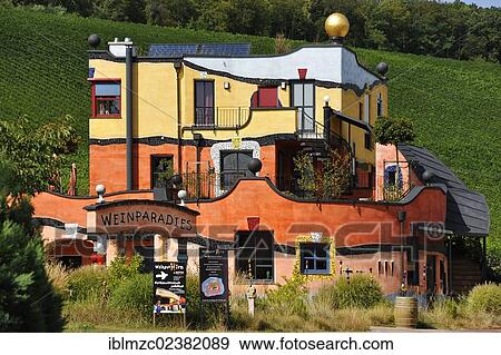 "Weingut Hirn winery, built by the artist Friedensreich Hundertwasser, surrounded by vineyards, Dipbacher Str 8, Untereisenheim, Lower Franconia, Bavaria, Germany, Europe, PublicGround, Europe" View Large Photo Image Stock Photo - "Weingut Hirn winery, built by the artist Friedensreich Hundertwasser, surrounded by vineyards, Dipbacher Str 8, Untereisenheim, Lower Franconia, Bavaria, Germany, Europe, PublicGround, Europe". Fotosearch