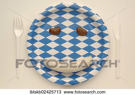 Weisswurst veal sausage making a face with mustard on a paper plate with the Bavarian diamond pattern View Large Photo Image Stock Image - Weisswurst veal sausage making a face with mustard on a paper plate with the Bavarian diamond pattern. Fotosearch