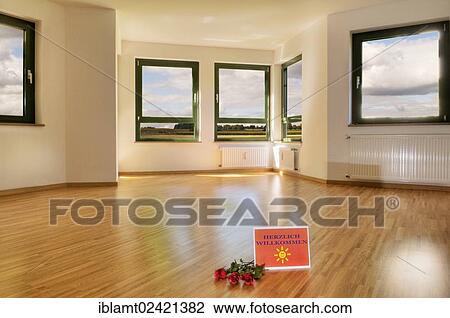 Welcome sign and roses on the floor, large living room with windows and light parquet flooring, compositing, rental apartment, real estate, freehold flat View Large Photo Image Stock Image - Welcome sign and roses on the floor, large living room with windows and light parquet flooring, compositing, rental apartment, real estate, freehold flat. Fotosearch