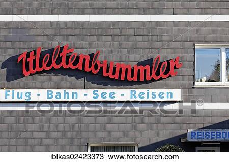 Weltenbummler, German for Globetrotter, old-fashioned lettering on a travel agency, Duisburg-Bruckhausen, Ruhr area, North Rhine-Westphalia, Germany, Europe View Large Photo Image Stock Image - Weltenbummler, German for Globetrotter, old-fashioned lettering on a travel agency, Duisburg-Bruckhausen, Ruhr area, North Rhine-Westphalia, Germany, Europe. Fotosearch