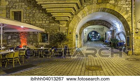Stock Photo - "Wenigemarkt with passage of the Agidienkirche to the Kramerbrucke in the evening, Erfurt, Thuringia, Germany, Europe". Fotosearch