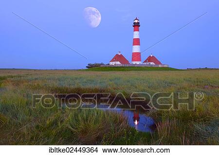 Picture - "Westerheversand lighthouse, moon, composing, Westerhever, North Sea, North Frisia, Schleswig-Holstein, northern Germany, Germany, Europe". Fotosearch