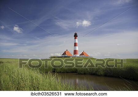 Stock Image - "Westerheversand lighthouse, Westerhever, Eiderstedt, North Frisia, Schleswig-Holstein, Germany, Europe". Fotosearch