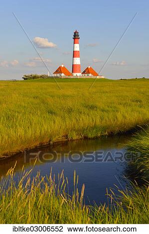 Stock Image - "Westerheversand lighthouse, Westerhever, Eiderstedt, North Frisia, Schleswig-Holstein, Germany, Europe". Fotosearch