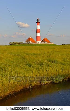 Stock Image - "Westerheversand Lighthouse, Westerhever, Eiderstedt, North Frisia, Schleswig-Holstein, Germany, Europe". Fotosearch