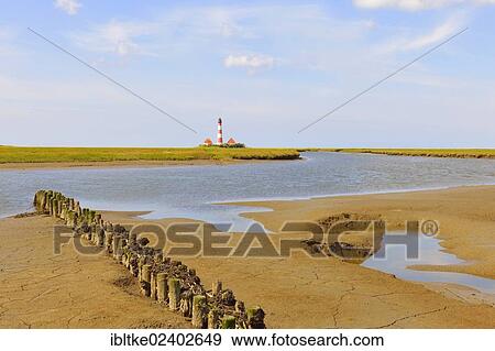Stock Photo - "Westerheversand Lighthouse, Westerhever, North Frisia, Schleswig-Holstein, northern Germany, Germany, Europe". Fotosearch