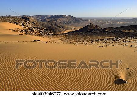 "Western escarpment of Tadrart plateau, Tassili n'Ajjer National Park, Unesco World Heritage Site, Sahara desert, Algeria, Africa" View Large Photo Image Stock Image - "Western escarpment of Tadrart plateau, Tassili n'Ajjer National Park, Unesco World Heritage Site, Sahara desert, Algeria, Africa". Fotosearch