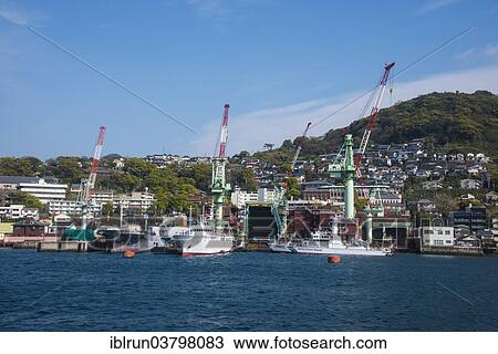 Stock Image - "Wharf in the harbour of Nagasaki, Nagasaki, Japan, Asia". Fotosearch