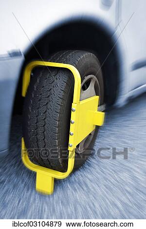 Stock Photo - "Wheel clamp on a motor vehicle, car, Hamburg Kirchwerder, Hamburg, Hamburg, Germany, Europe". Fotosearch