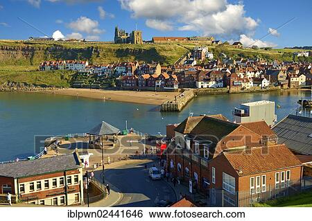 Stock Photograph - "Whitby harbour looking towards Whitby Abbey, Whitby, North Yorkshire, England, United Kingdom, Europe". Fotosearch