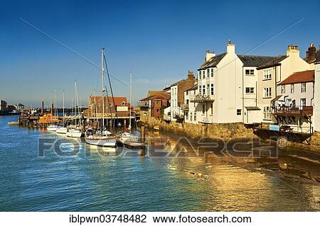 Stock Image - "Whitby harbour, North Yorkshire, England, United Kingdom, Europe". Fotosearch