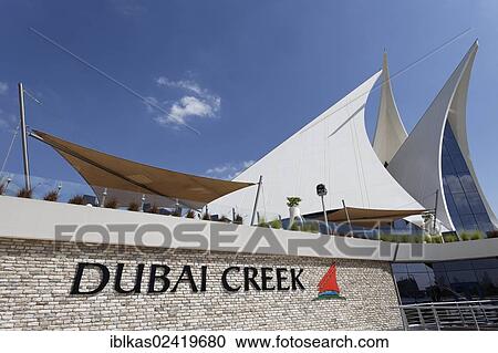 White building in the form of sails, Dubai Creek Golf Club, Dubai, United Arab Emirates, Middle East, Asia View Large Photo Image Stock Image - White building in the form of sails, Dubai Creek Golf Club, Dubai, United Arab Emirates, Middle East, Asia. Fotosearch