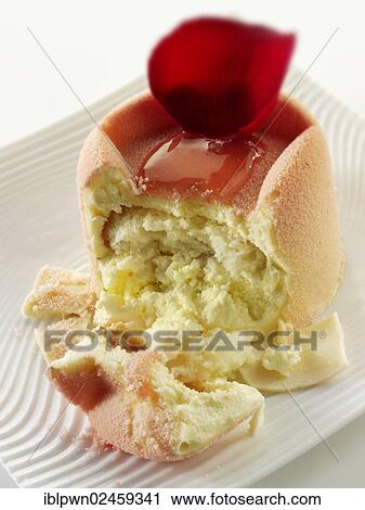 "White chocolate cake with a sponge case and strawberry filling, covered with pink white chocolate powder" View Large Photo Image Stock Image - "White chocolate cake with a sponge case and strawberry filling, covered with pink white chocolate powder". Fotosearch
