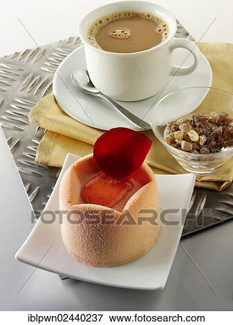 "White chocolate cake with a sponge case and strawberry filling, covered with pink white chocolate powder" View Large Photo Image Stock Photo - "White chocolate cake with a sponge case and strawberry filling, covered with pink white chocolate powder". Fotosearch