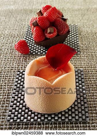 "White chocolate cake with a sponge case and strawberry filling, covered with pink white chocolate powder" View Large Photo Image Stock Photo - "White chocolate cake with a sponge case and strawberry filling, covered with pink white chocolate powder". Fotosearch