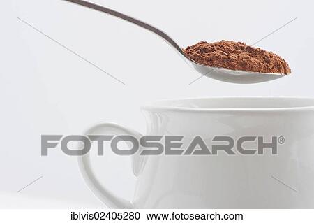 White cup and spoon with cocoa powder View Large Photo Image Stock Image - White cup and spoon with cocoa powder. Fotosearch