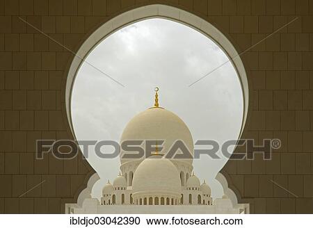 "White domes seen through the top of an arch of the archway of Sheikh Zayed Grand Mosque, Abu Dhabi, Emirate of Abu Dhabi, United Arab Emirates, Asia" View Large Photo Image Stock Image - "White domes seen through the top of an arch of the archway of Sheikh Zayed Grand Mosque, Abu Dhabi, Emirate of Abu Dhabi, United Arab Emirates, Asia". Fotosearch