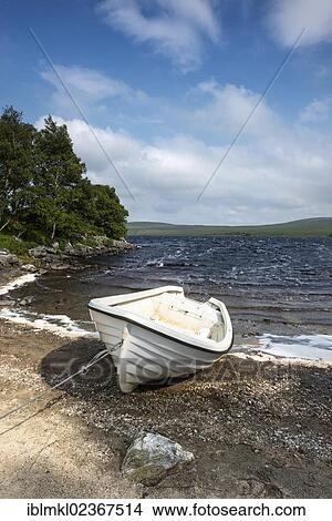 "White fishing boat on the shore of Loch Naver, County of Sutherland, Scotland, United Kingdom, Europe" View Large Photo Image Picture - "White fishing boat on the shore of Loch Naver, County of Sutherland, Scotland, United Kingdom, Europe". Fotosearch