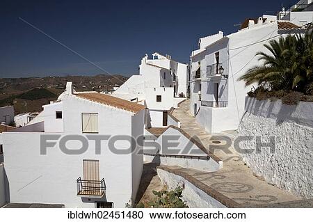"White houses in a narrow alley in Frigiliana, Nerja, Costa del Sol, Andalusia, Spain, Europe, PublicGround, Europe" View Large Photo Image Stock Image - "White houses in a narrow alley in Frigiliana, Nerja, Costa del Sol, Andalusia, Spain, Europe, PublicGround, Europe". Fotosearch