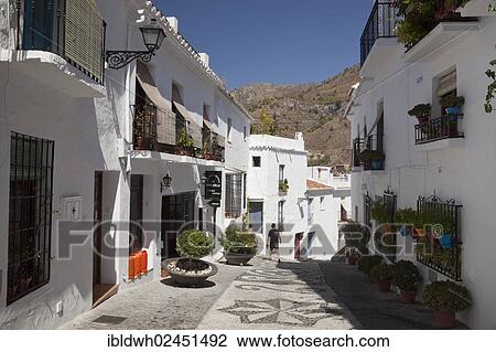 "White houses in a narrow alley in Frigiliana, Nerja, Costa del Sol, Andalusia, Spain, Europe, PublicGround, Europe" View Large Photo Image Stock Image - "White houses in a narrow alley in Frigiliana, Nerja, Costa del Sol, Andalusia, Spain, Europe, PublicGround, Europe". Fotosearch