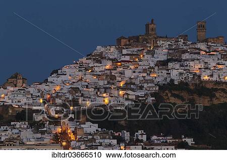 "Whitewashed village of Arcos de la Frontera on a limestone rock at dawn, Arcos de la Frontera, Cadiz province, Andalusia, Spain, Europe" View Large Photo Image Stock Image - "Whitewashed village of Arcos de la Frontera on a limestone rock at dawn, Arcos de la Frontera, Cadiz province, Andalusia, Spain, Europe". Fotosearch