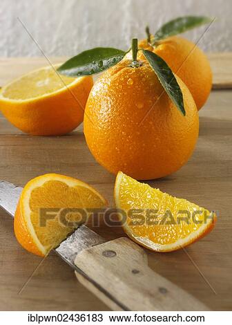 Whole and cut fresh oranges View Large Photo Image Stock Image - Whole and cut fresh oranges. Fotosearch