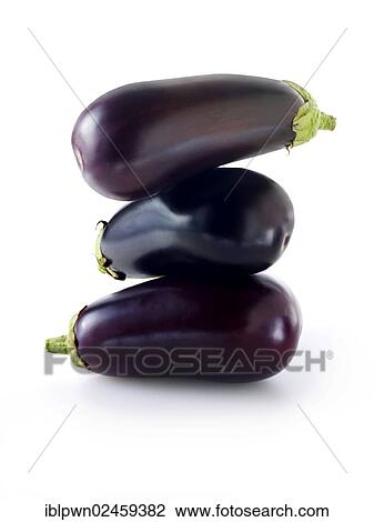 Stock Image - Whole fresh aubergines. Fotosearch