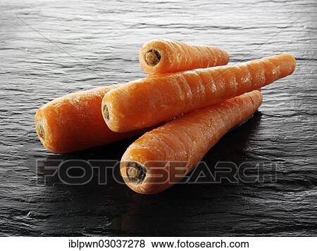 Whole fresh carrots View Large Photo Image Stock Photo - Whole fresh carrots. Fotosearch
