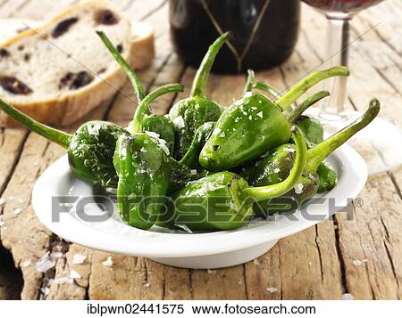 Whole griddled Padron peppers snack with sea salt View Large Photo Image Stock Photography - Whole griddled Padron peppers snack with sea salt. Fotosearch
