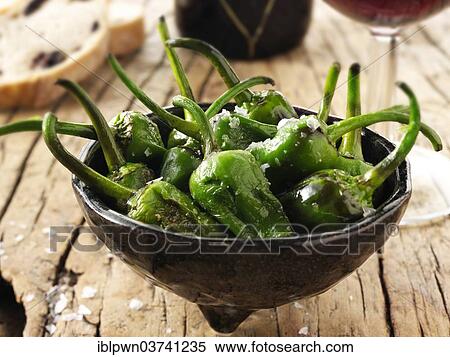 Whole griddled Padron peppers with sea salt View Large Photo Image Stock Photography - Whole griddled Padron peppers with sea salt. Fotosearch