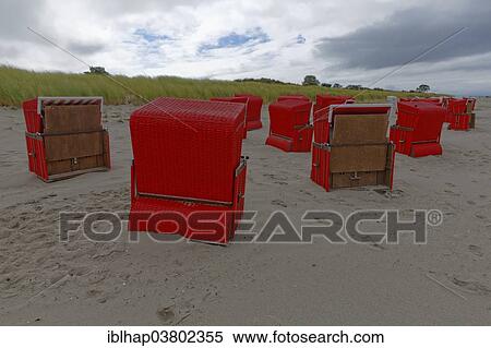 "Wicker beach chairs on the beach of Ahrenshoop, Mecklenburg-Vorpommern, Germany, Europe" View Large Photo Image Stock Photography - "Wicker beach chairs on the beach of Ahrenshoop, Mecklenburg-Vorpommern, Germany, Europe". Fotosearch