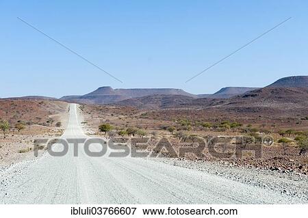 "Wide, straight gravel road in arid landscape, Kunene Region, Namibia, Africa" View Large Photo Image Stock Photo - "Wide, straight gravel road in arid landscape, Kunene Region, Namibia, Africa". Fotosearch