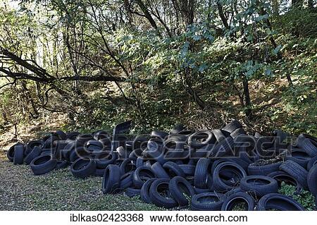 Wild dump with car tyres, Duisburg-Bruckhausen, Ruhr area, North Rhine-Westphalia, Germany, Europe View Large Photo Image Stock Photo - Wild dump with car tyres, Duisburg-Bruckhausen, Ruhr area, North Rhine-Westphalia, Germany, Europe. Fotosearch