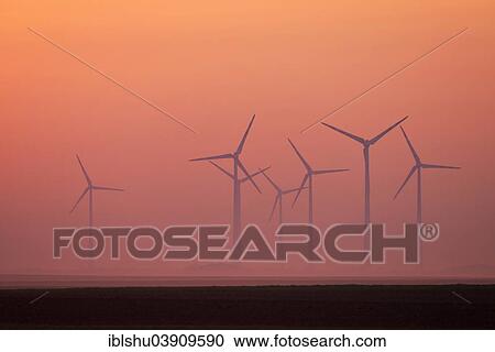 "Wind farm in the fog, morning light, Frauenkirchen, Burgenland, Austria, Europe" View Large Photo Image Stock Image - "Wind farm in the fog, morning light, Frauenkirchen, Burgenland, Austria, Europe". Fotosearch
