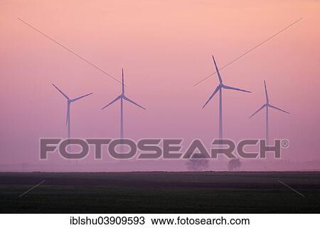 "Wind farm in the fog, morning light, Frauenkirchen, Burgenland, Austria, Europe" View Large Photo Image Stock Image - "Wind farm in the fog, morning light, Frauenkirchen, Burgenland, Austria, Europe". Fotosearch