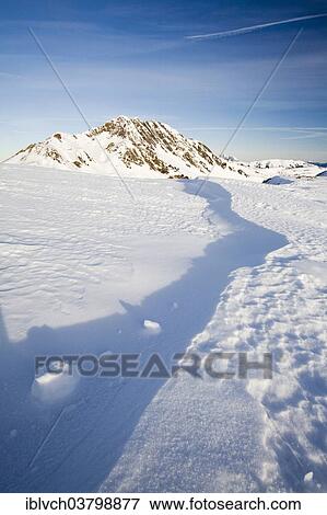 "Wind pressed snow pack, Kleiner Rettenstein Mountain, Thurn Pass, Tyrol, Austria, Europe" View Large Photo Image Stock Photo - "Wind pressed snow pack, Kleiner Rettenstein Mountain, Thurn Pass, Tyrol, Austria, Europe". Fotosearch