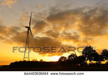 Picture - "Wind turbine at sunset, North Rhine-Westphalia, Germany, Europe". Fotosearch