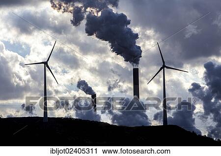"Wind turbine on the Halde Scholven heap next to the E. ON coal-fired power plant Scholven, power lines, Gelsenkirchen, North Rhine-Westphalia, Germany, Europe" View Large Photo Image Stock Image - "Wind turbine on the Halde Scholven heap next to the E. ON coal-fired power plant Scholven, power lines, Gelsenkirchen, North Rhine-Westphalia, Germany, Europe". Fotosearch