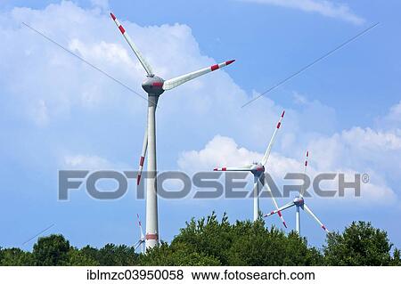 "Wind turbines against a cloudy sky, Brandenburg, Germany, Europe" View Large Photo Image Stock Photo - "Wind turbines against a cloudy sky, Brandenburg, Germany, Europe". Fotosearch