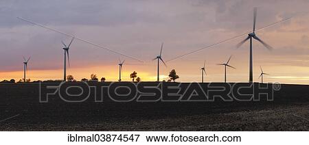 "Wind turbines at sunset, island of Fehmarn, Schleswig-Holstein, Germany, Europe" View Large Photo Image Stock Photo - "Wind turbines at sunset, island of Fehmarn, Schleswig-Holstein, Germany, Europe". Fotosearch