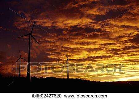 Stock Image - "Wind turbines in the Hunsrueck region near Kirchberg, Rhineland-Palatinate, Germany, Europe". Fotosearch