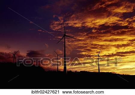Stock Image - "Wind turbines in the Hunsrueck region near Kirchberg, Rhineland-Palatinate, Germany, Europe". Fotosearch