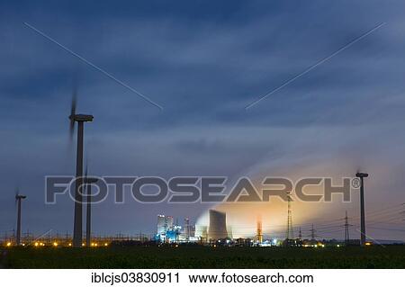 "Windfarm in front of the Niederaussem lignite-fired power station, at night, Niederaussem, North Rhine-Westphalia, Germany, Europe" View Large Photo Image Stock Image - "Windfarm in front of the Niederaussem lignite-fired power station, at night, Niederaussem, North Rhine-Westphalia, Germany, Europe". Fotosearch